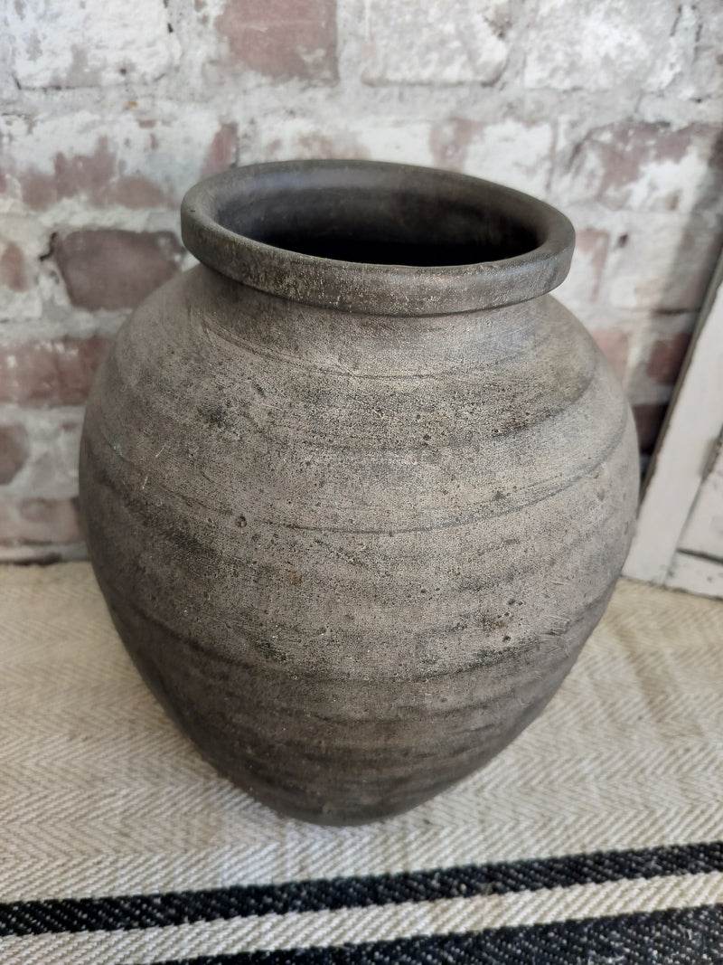 Antique rustic large French clay pot with matt unglazed finish and aged charcoal grey-brown texture