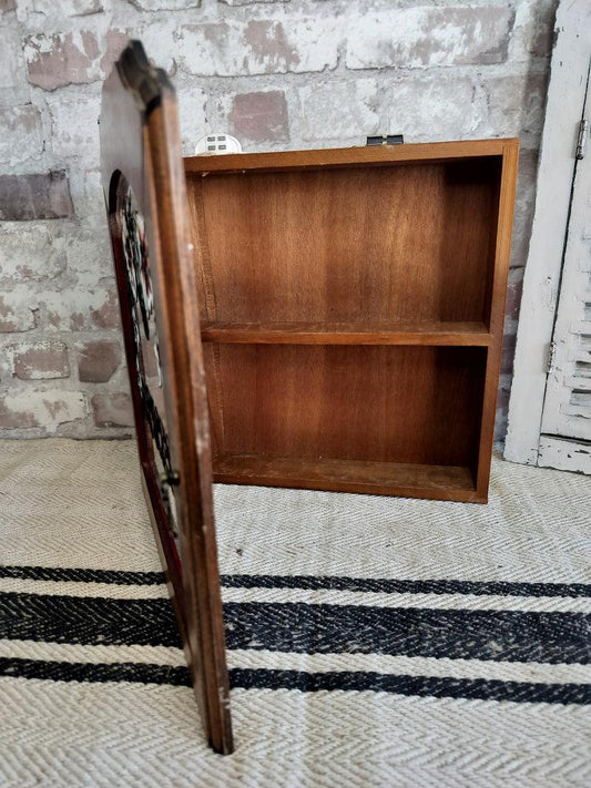 French vintage wooden spice cabinet with open door showing two shelves and stained glass floral front panel with "Epices" lettering