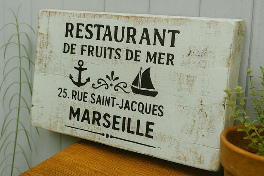 Handmade wooden seafood restaurant sign with French blue distressed finish and nautical design