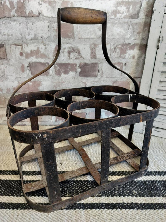 Rustic vintage French metal bottle carrier with wooden handle, 6-slot holder with aged patina
