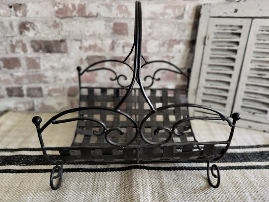 Vintage French metal log basket with woven lattice base and decorative scrollwork handle
