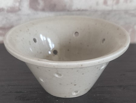 Vintage French faisselle cheese mould with drainage holes in speckled glazed stoneware