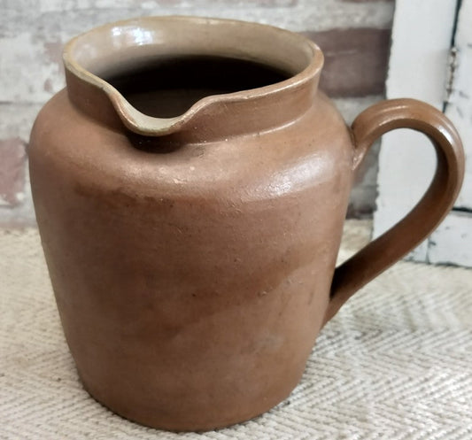 Vintage French Pot Nantais stoneware jug with pouring spout and handle in warm terracotta tones