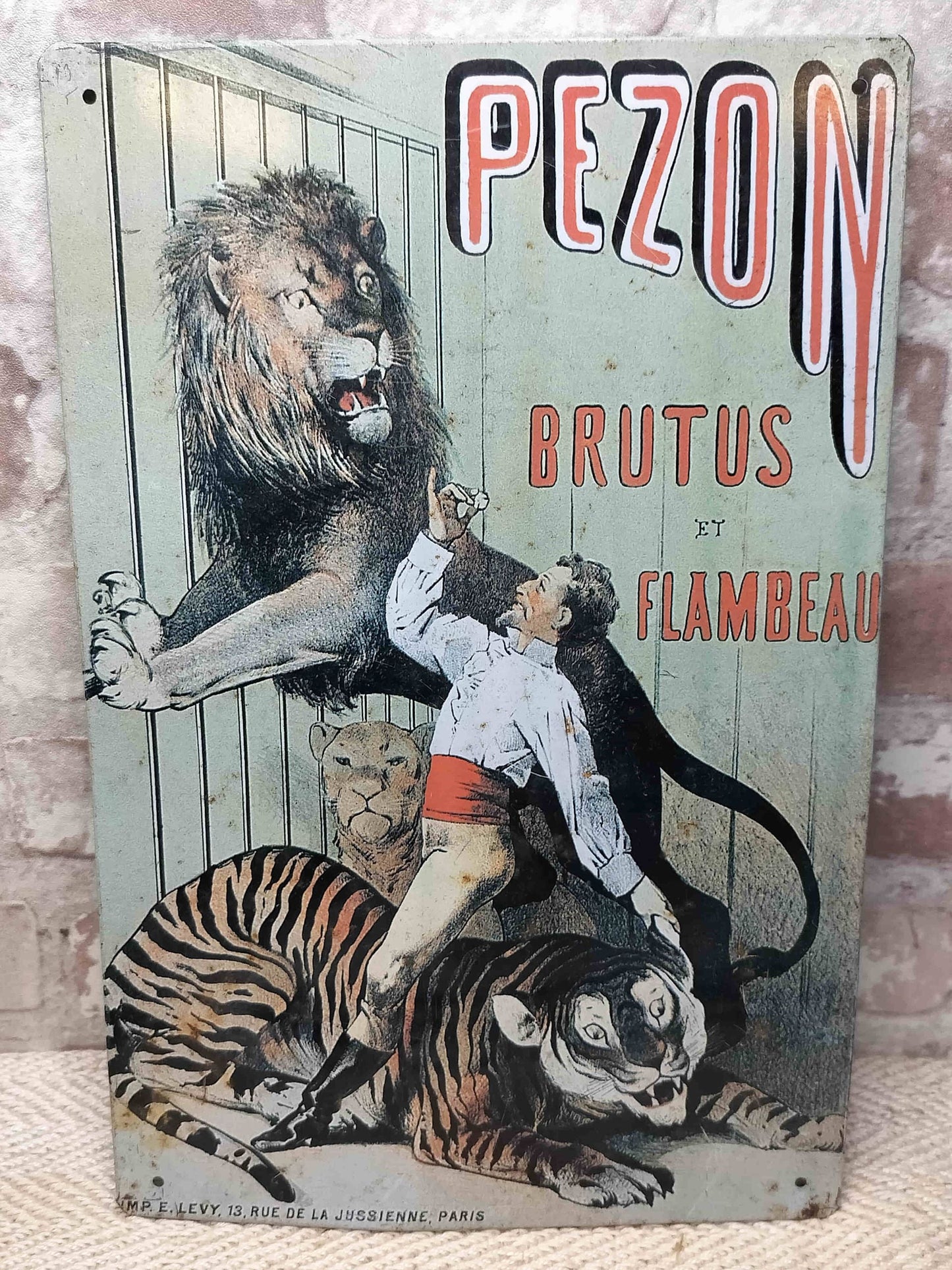 Vintage French Pezon Brutus et Flambeau Metal Sign